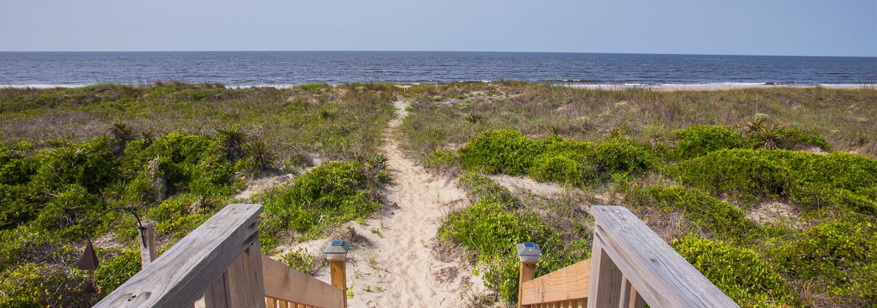 View of Oak Island beach from a vacation rental home