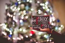 exchanging gifts in front of tree