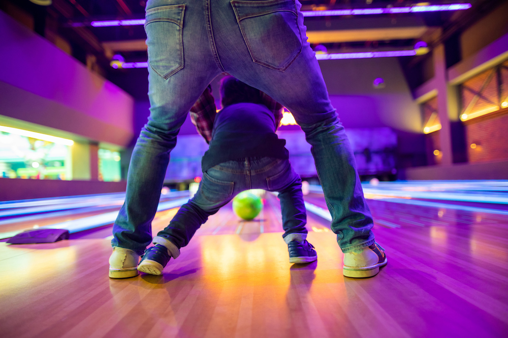 father and son bowling